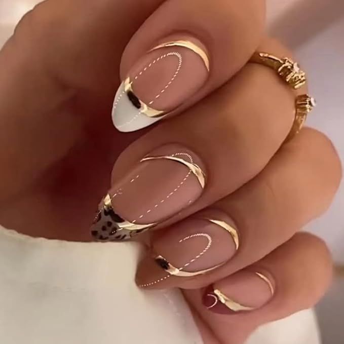 Gold foil on deep-toned nails
