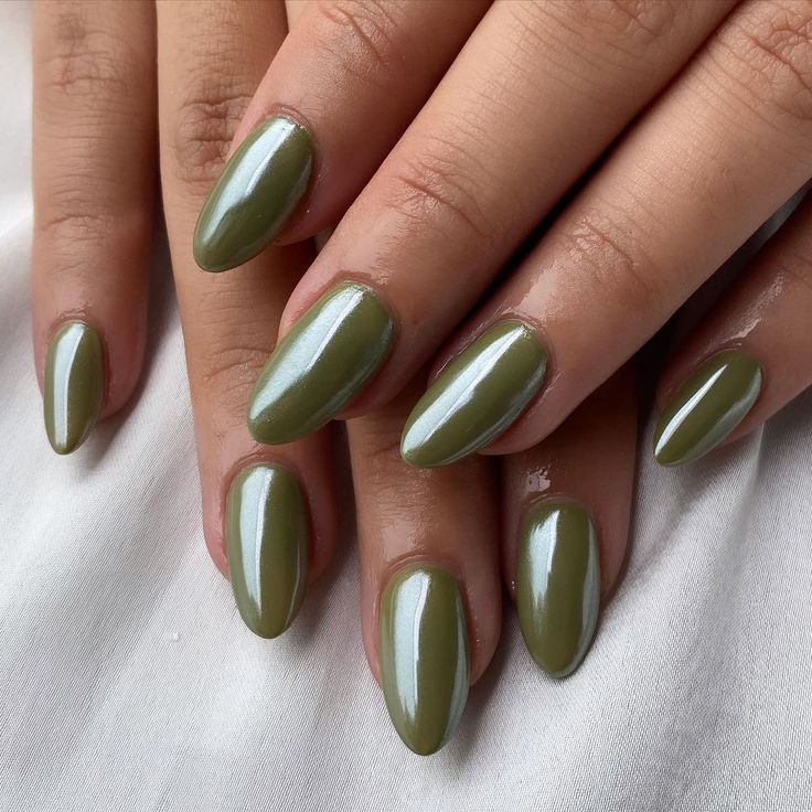 Olive green almond nails, muted elegance
