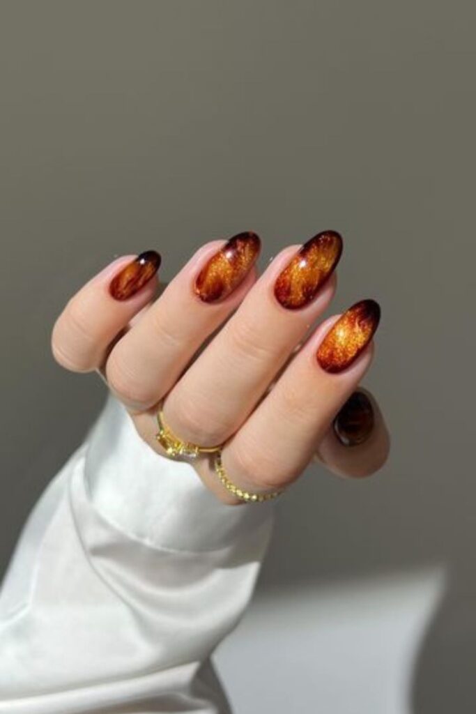 Ombre fall colors on almond nails
