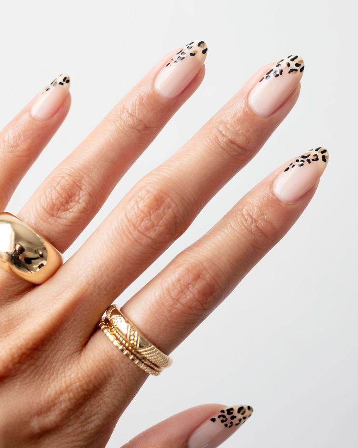 Subtle animal print almond nails
