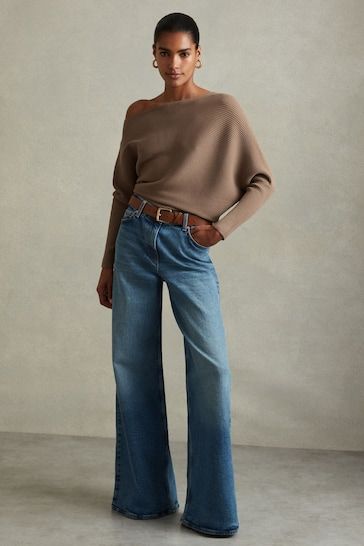 Asymmetrical top with wide-leg jeans