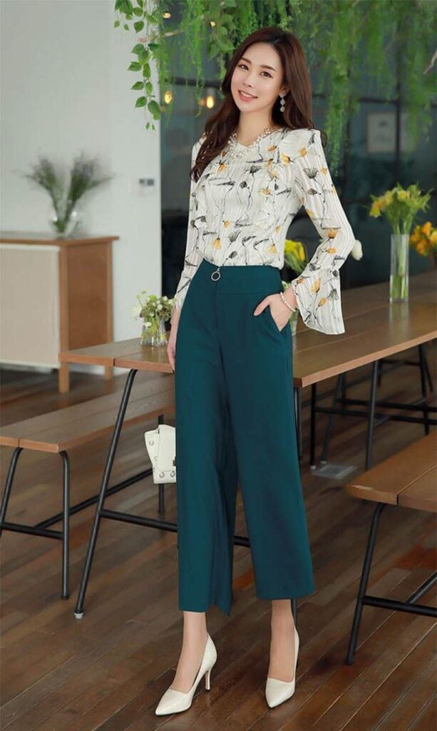 Puff sleeve top with high-waisted slacks