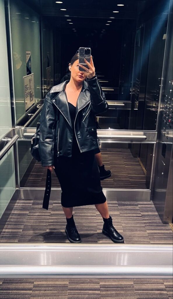 Leather jacket adds edgy vibes.